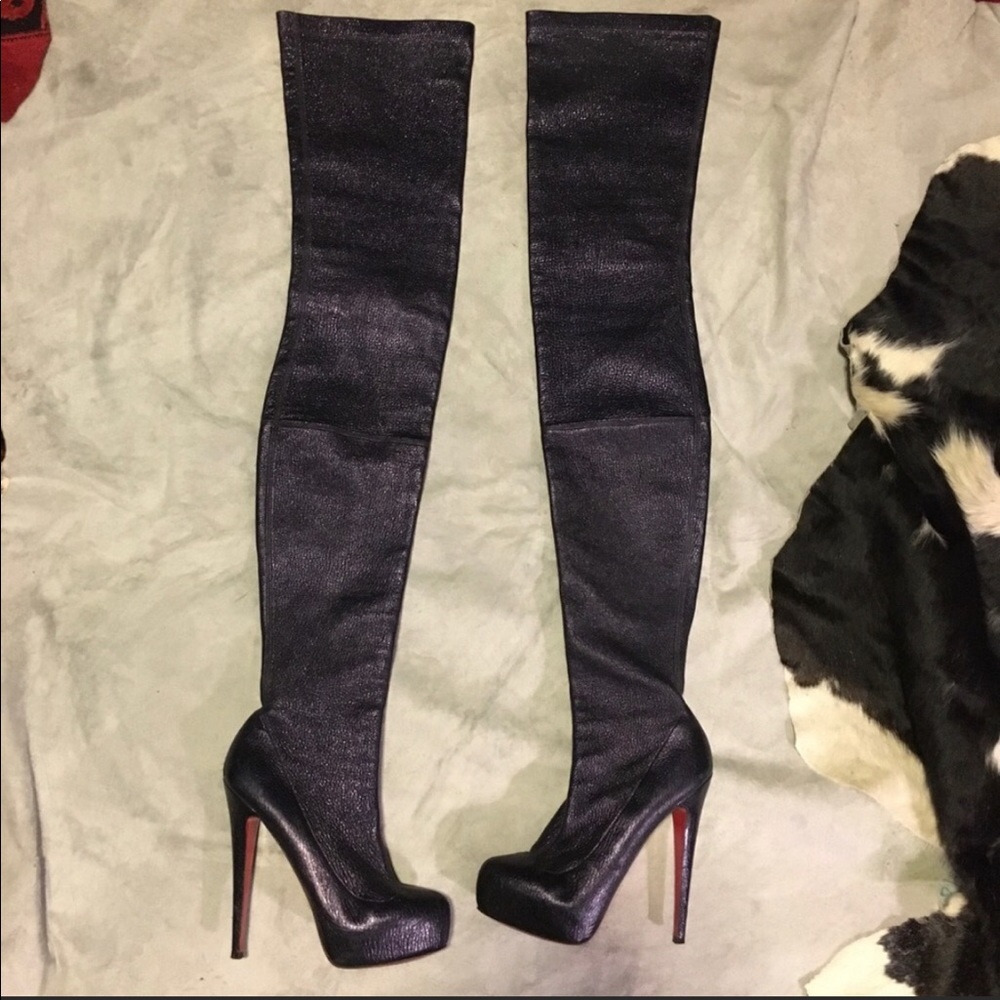 Christian Louboutin thigh-high boots.